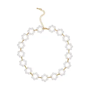 French elegant pearl floral choker necklace with gold-plated adjustable chain.