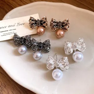Elegant vintage style wrinkled bow pearl drop earrings with S925 silver needles for women.