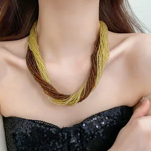 Elegant vintage multi-strand seed bead necklace in twisted gold and amber colors
