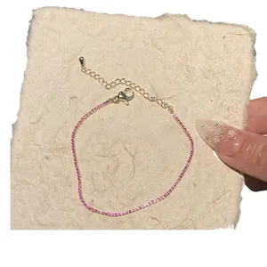 Ultra-thin square pink zircon bracelet featuring a gold-plated adjustable chain