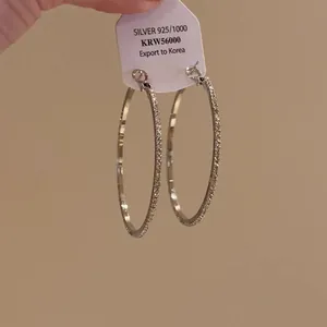 Elegant S925 silver textured hoop earrings for minimalist daily fashion and luxury style