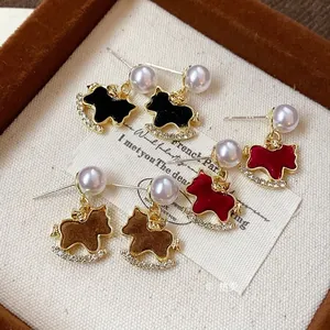 Minimalist horse-shaped earrings with pearls and rhinestones on sterling silver studs