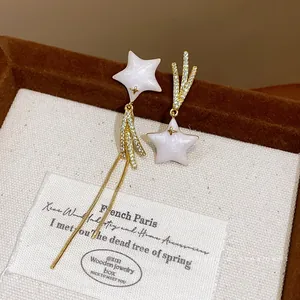Asymmetric 18k gold plated star stud earrings with zircon inlay and long tassels