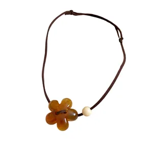 Elegant minimalist resin flower pendant necklace with adjustable brown cord for women