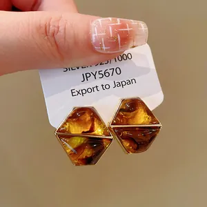 Vintage Maillard style amber resin hexagonal stud earrings with silver needles for women