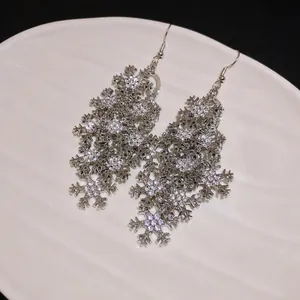 Elegant silver rhinestone snowflake tassel drop earrings for women, minimalist style