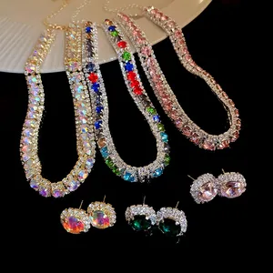 Detailed macro view of colorful luxury zircon necklaces and matching stud earrings in various colors
