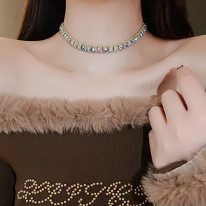 Close-up of sparkly AB rhinestone choker necklace on model's neck for elegant look.