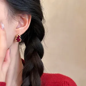 Elegant gold-plated wulu gourd stud earrings with red velvet zircon stones for women