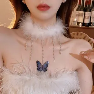 Elegant white feather choker necklace with a blue butterfly pendant and bead tassels.