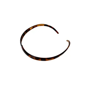 Serre-tête élégant en acrylique écaille de tortue avec motif léopard pour femmes