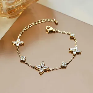 Elegant gold-plated zircon flower chain bracelet with sparkling crystal accents for women.