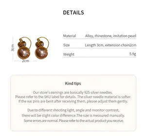 Détails des boucles d'oreilles cœur strass style français avec paramètres de taille précis.