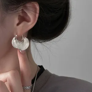 Stylish textured silver crescent hoop earrings for women with minimalist geometric design