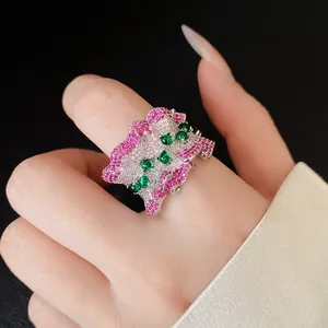 Detailed macro view of a Korean style pleated zircon irregular open ring on a finger
