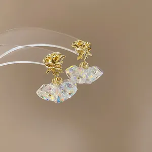 Gold rose stud earrings with iridescent crystal drops, elegant vintage court style