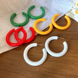 Colorful acrylic C-shaped hoop earrings with silver pins in vibrant dopamine colors