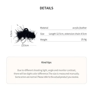Detailed view of black feather hair claw clip with size and material specifications