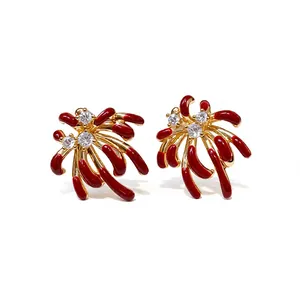 Luxury 18k gold plated firework earrings featuring red enamel and sparkling cubic zirconia