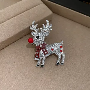 Detailed view of a sparkling crystal reindeer pendant featuring a red scarf for Christmas.
