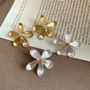 Elegant Korean style flower stud earrings with silver needles in gold and silver finish