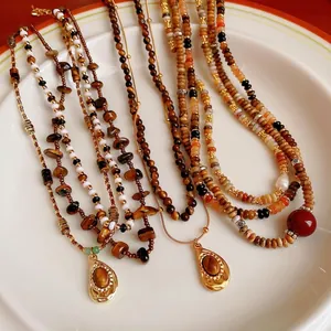 Collier Pendentif Perles en Pierre Oeil de Tigre Vintage pour Femmes Rétro Style Maillard Marron Alliage Chaîne de Pull Bijoux