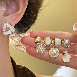Elegant 16-piece set of geometric pearl and cat eye stone stud earrings for women