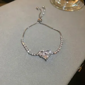 Elegant silver heart zircon bracelet with an adjustable drawstring chain for women