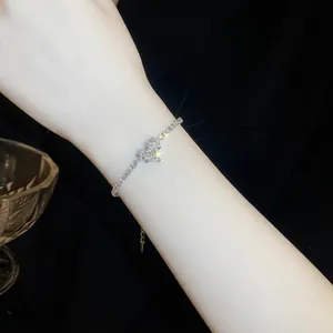 Elegant zircon heart bracelet for women featuring sparkling stones worn on the wrist