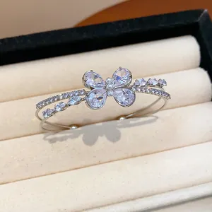 Detailed view of an elegant silver-colored double-layer butterfly bangle with zircons.