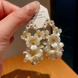Vintage shell flower drop earrings with S925 silver needles and sparkling cubic zirconia