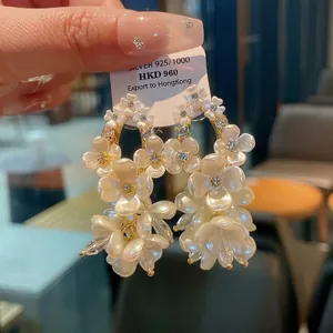 French vintage shell flower drop earrings with sparkling zircon for elegant wedding style.