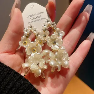 Elegant shell flower dangle earrings with rhinestones and vintage French design detail