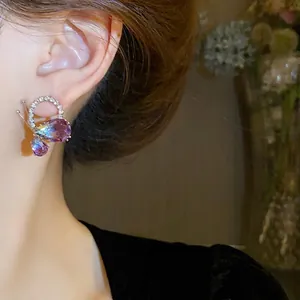 Elegant silver needle butterfly earrings with gradient teardrop crystals and rhinestones