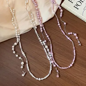 Elegant French style long pearl necklace with rhinestones, versatile luxury sweater chain