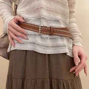 Western style brown leather belt with double rows of silver studs detail for women
