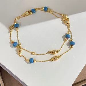 Elegant vintage royal style gold chain necklace set with decorative blue beads for women