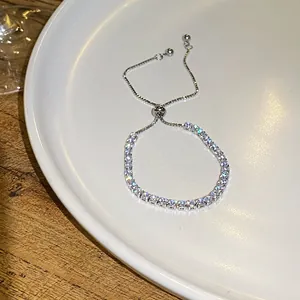 High-quality macro view of silver zircon tennis bracelet with a secure adjustable slider closure