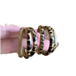 Retro fashion leopard print hoop earrings featuring vintage patterned texture for women