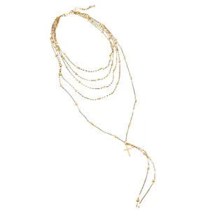 Elegant multi-layered gold chain necklace with zircon cross pendant design