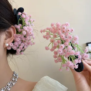 Detailed view of a sweet Mori-style pink flower cluster duckbill hair clip for women