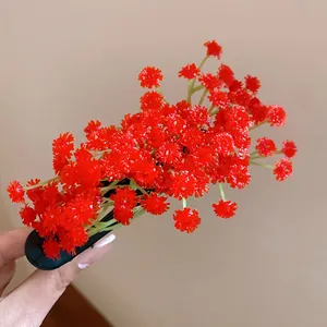 Close-up detailed view of a sweet red cluster flower hair clip with duckbill design.
