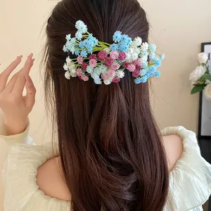 Close-up detail of sweet forest style duckbill hair clip with colorful flower clusters