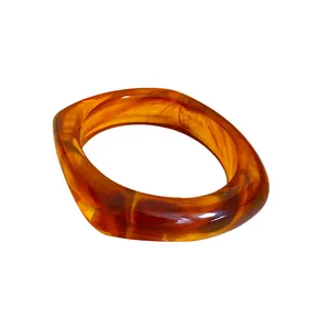 Elegant amber marbled square resin bangle bracelet with minimalist vintage style