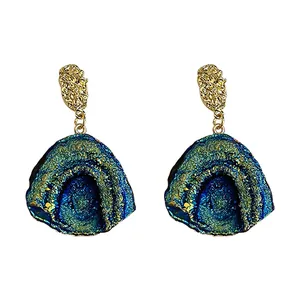 Luxury irregular blue fan-shaped druzy drop earrings with gold textured studs.