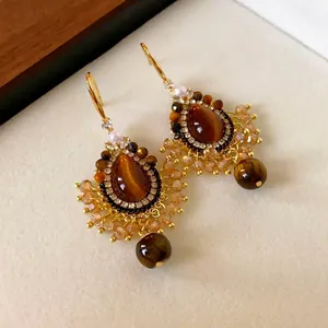 Vintage ethnic teardrop earrings featuring tiger eye stone and sparkling zircon tassels