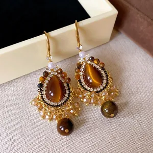 Bohemian retro drop earrings with faux tiger eye stones and tassel details