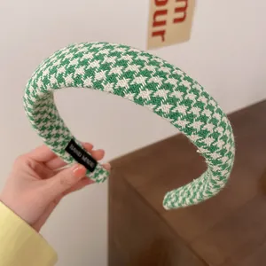 Green houndstooth padded headband with high top for a sweet and chic daily hair look