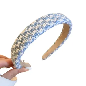 Elegant blue and white woven plaid headband for a stylish daily hair accessory.