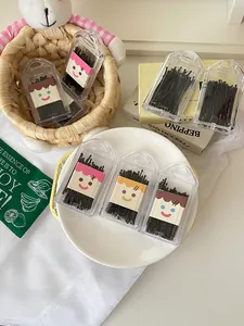 Professional black bobby pins in cute portable storage cases for hair styling details